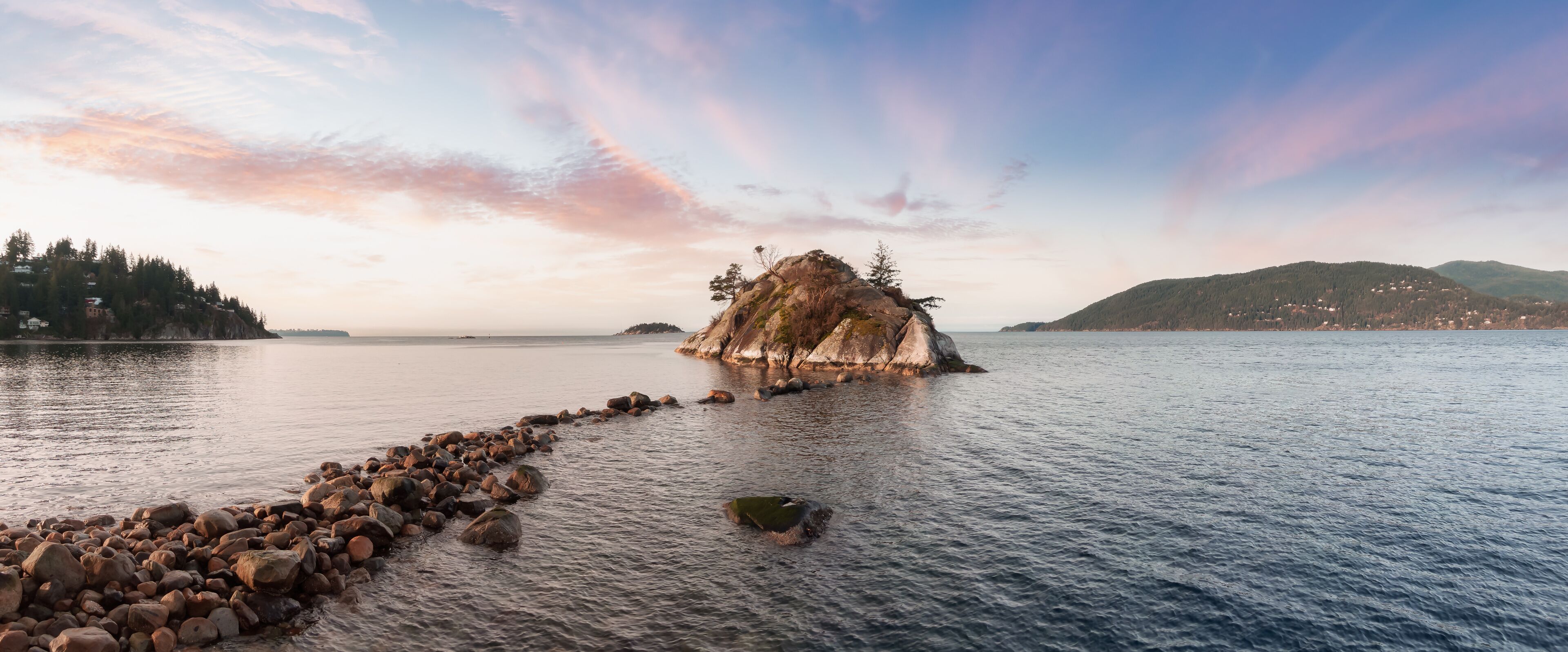 Aerial Panoramic View of Rocky Island on the Pacific Ocean West Coast.