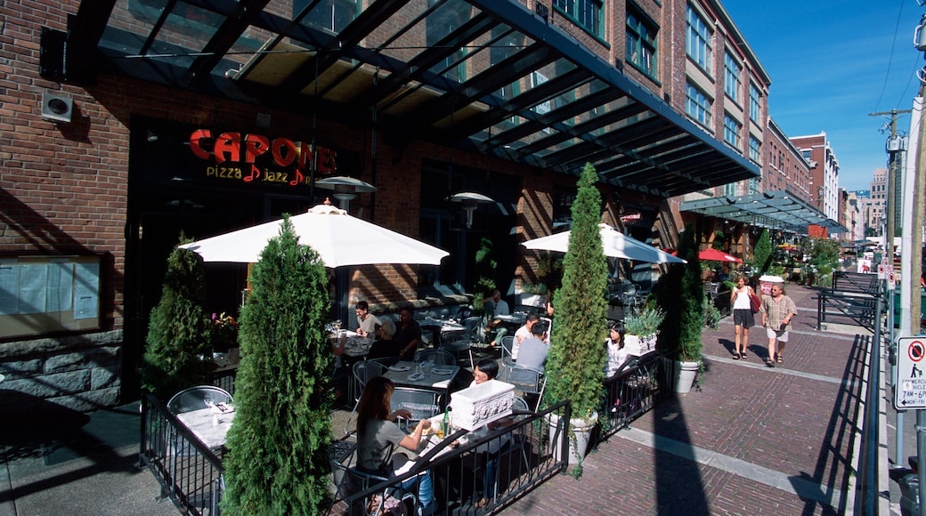 Vibrant outdoor dining scene in Yaletown showcasing sunny atmosphere in Vancouver, British Columbia