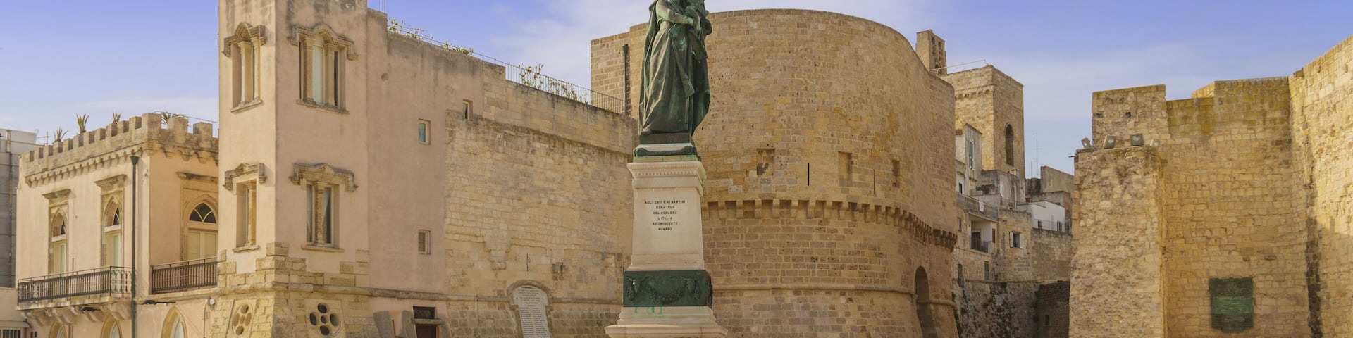 The most beautiful old towns of Italy. Apulia: historical center of Otranto in Salento. Promenade of Heroes: medieval tower and monument erected for martyrs.