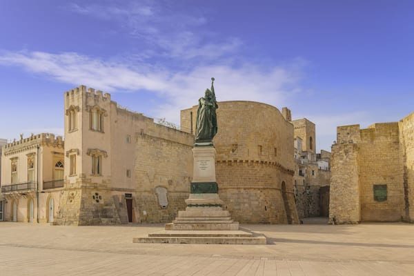 The most beautiful old towns of Italy. Apulia: historical center of Otranto in Salento. Promenade of Heroes: medieval tower and monument erected for martyrs.