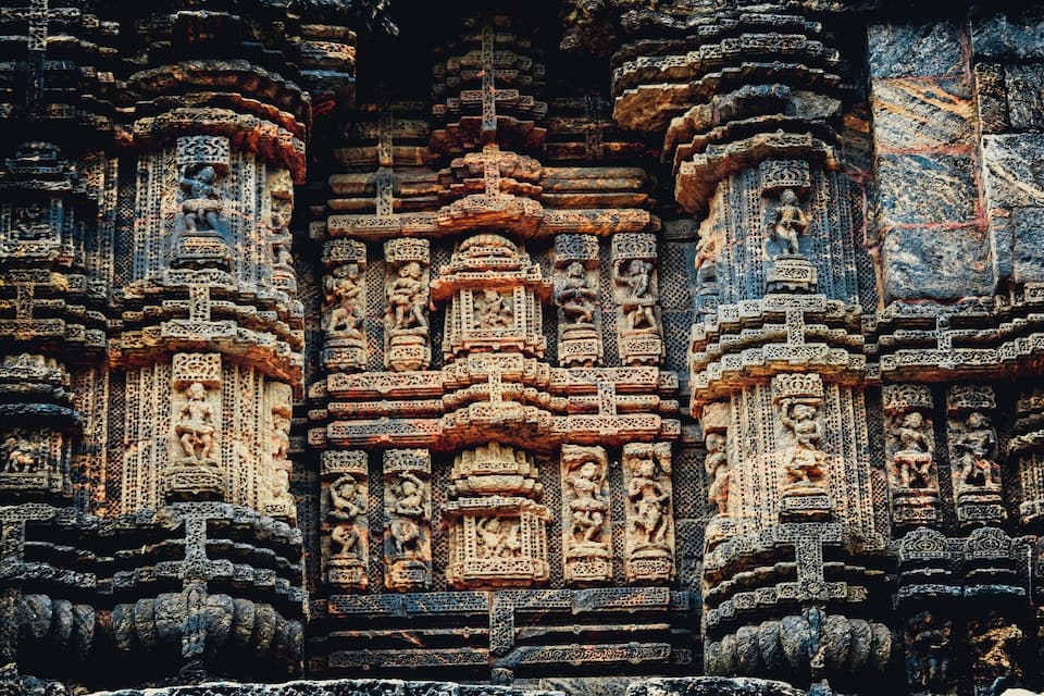 Intricate stone carvings and architectural details of an ancient temple.