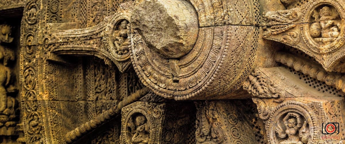 Detailed stone carvings with intricate patterns and figures.