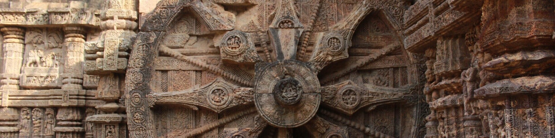 The sun temple at konark. The chariot of the Sun God is carried by 7 might horses who represent the 7 days of the week. It runs on 12 wheels - 6 on each side of the chariot representing the 12 months of the year. Each wheel is divided in 8 thick spokes and 8 thin spokes depicting the praharas or the different time of the day.
Even today the sun dial shows the exact time.