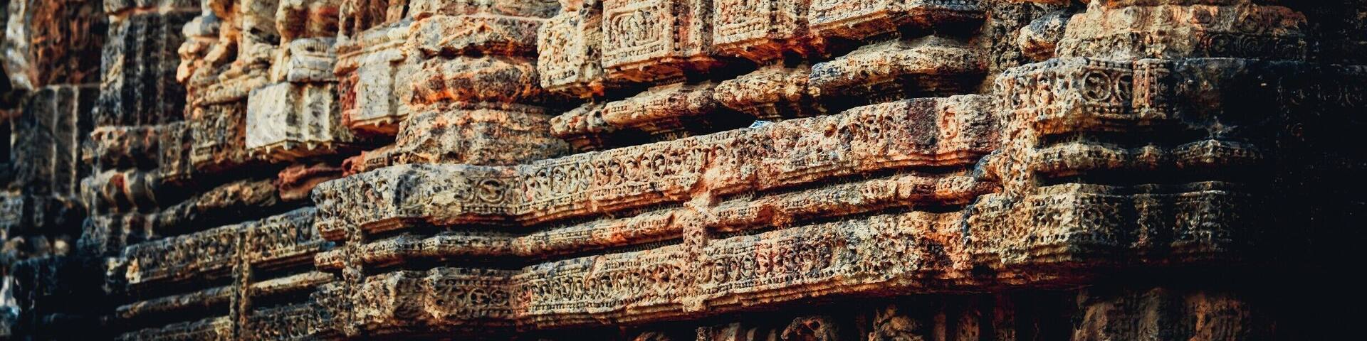 Konark Sun Temple is a 13th-century CE Sun Temple at Konark in Orissa, India. It is believed that the temple was built by king Narasimhadeva I of Eastern Ganga Dynasty in 1255 CE. The temple complex is in the shape of a gigantic chariot, having elaborately carved stone wheels, pillars and walls. A major part of the structure is now in ruins. The temple is a UNESCO World Heritage Site and has also featured on various list of Seven Wonders of India. The temple is 35 km from Puri and 65 km from Bhubaneswar.
The name Konark derives from the combination of the Sanskrit words, Kona (corner or angle) and Ark (the sun), in reference to the temple which was dedicated to the Sun God Surya.