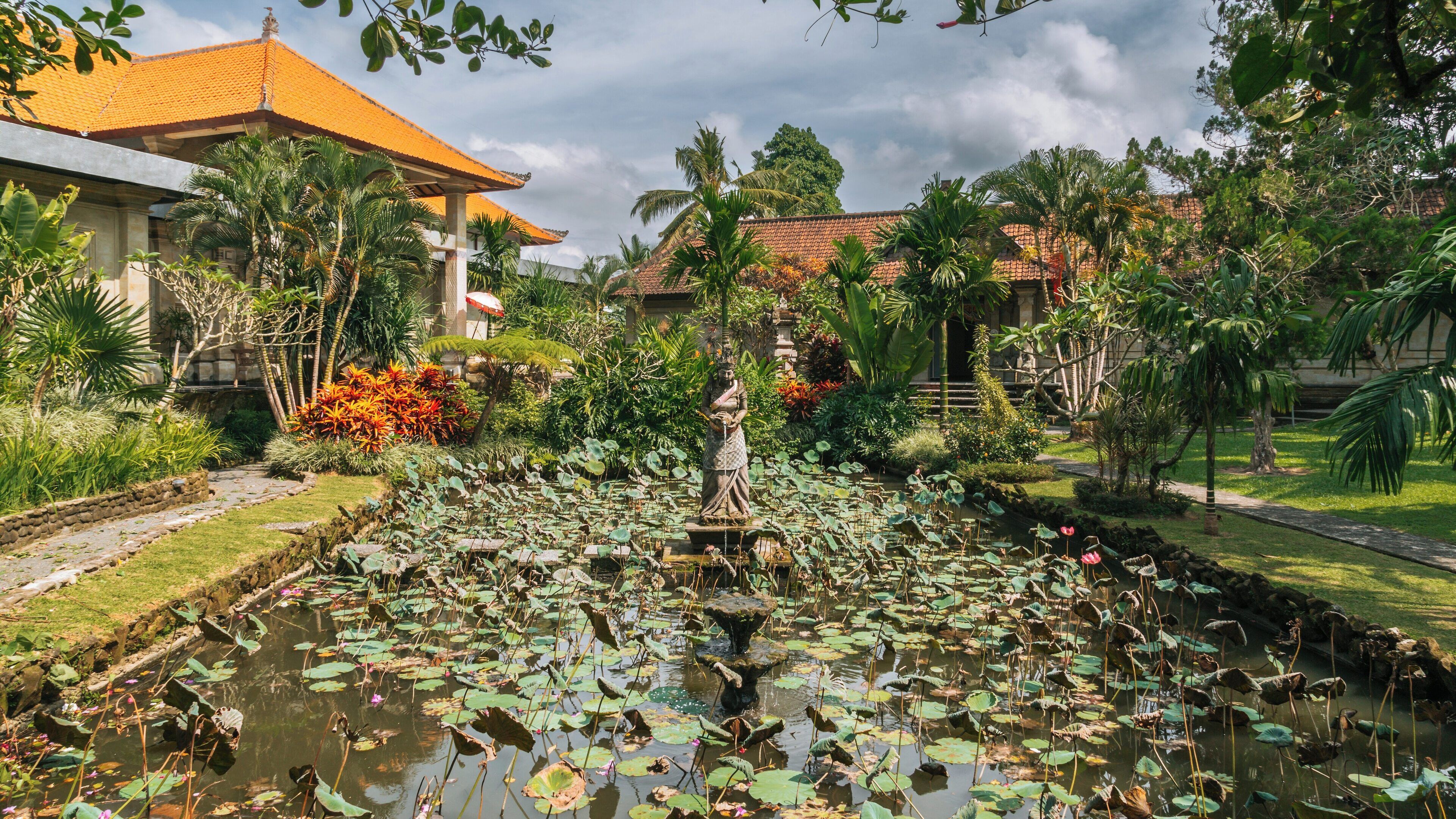 Explore the tranquil gardens and artistic ambiance of Puri Lukisan Museum in Ubud, Bali, Indonesia, a cultural haven nestled in lush surroundings