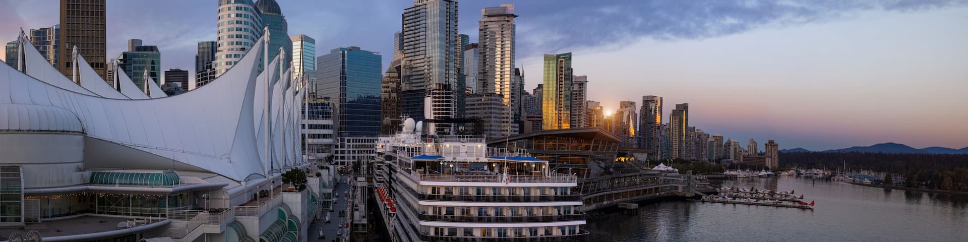Panoramic view of Vancouver downtown Coal Harbor Marina and cruise ship terminals in Canada Place.