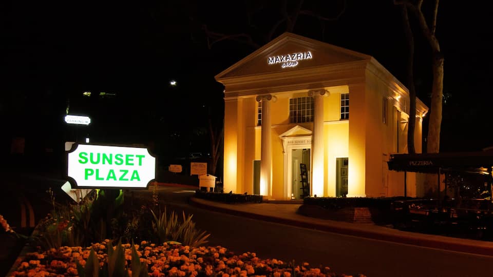 Sunset Strip featuring signage, night scenes and heritage architecture