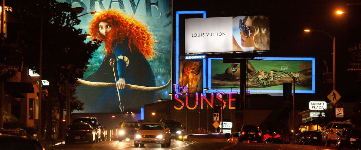 Sunset Strip which includes signage and night scenes
