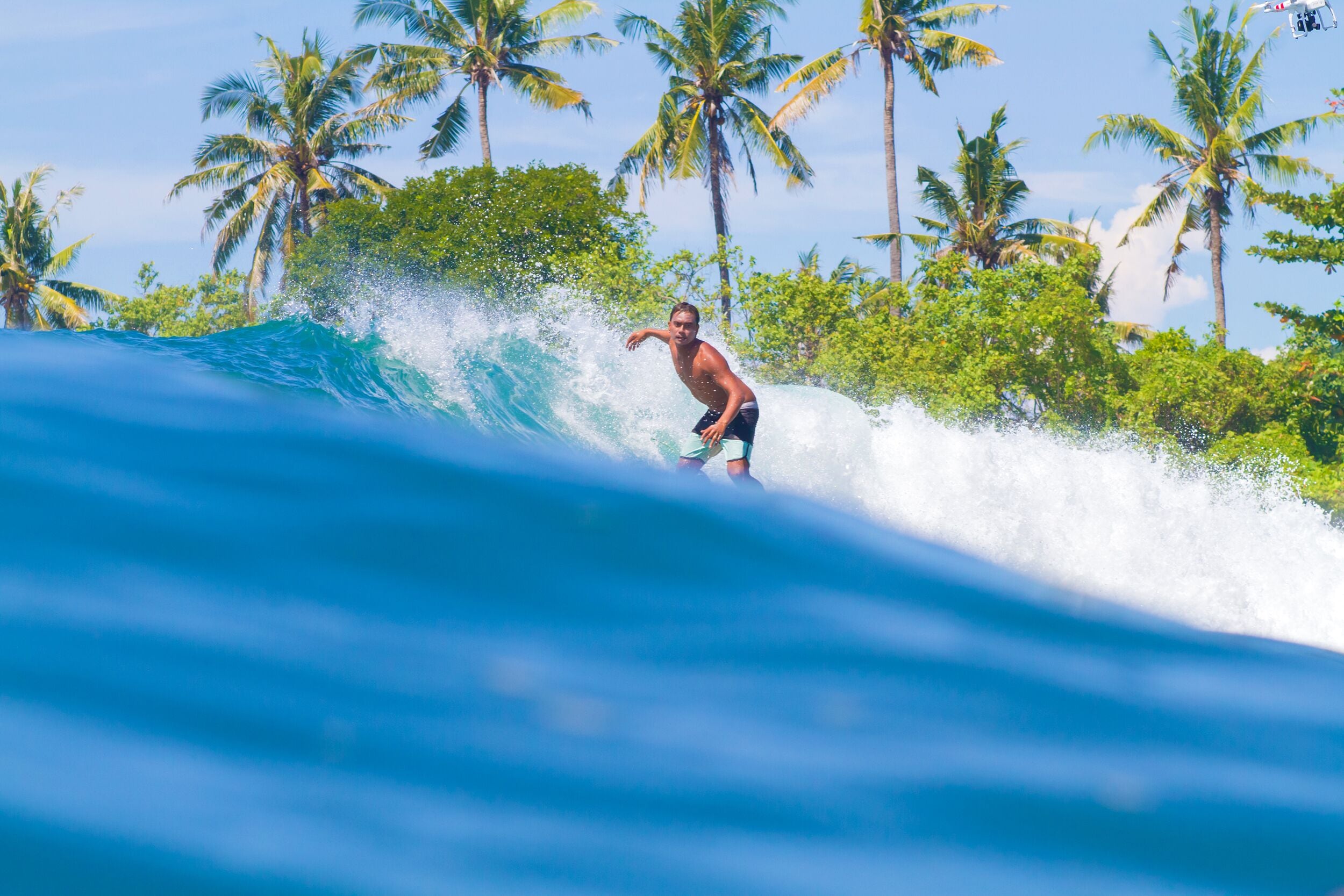 Picture of Surfing a Wave. Bali Island. Indonesia