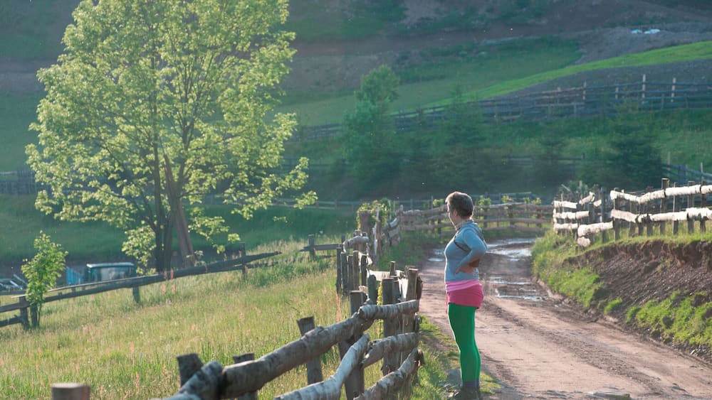 'For the evening walk, we decided to climb one of the hills facing our guesthouse. Our nostrils were invaded by the smells of the countryside, of the wild flowers, and of the trees seen through the small stretches of forest we came across. The view on the other side of the hill was unforgettable: Cobleş Village in the dim light of the setting sun. ‘It should be quite a feast waking up every day to this view’ I told an old lady approaching us. It all felt so mellow, light, and close to the original beauty of places and goodness in the people.'