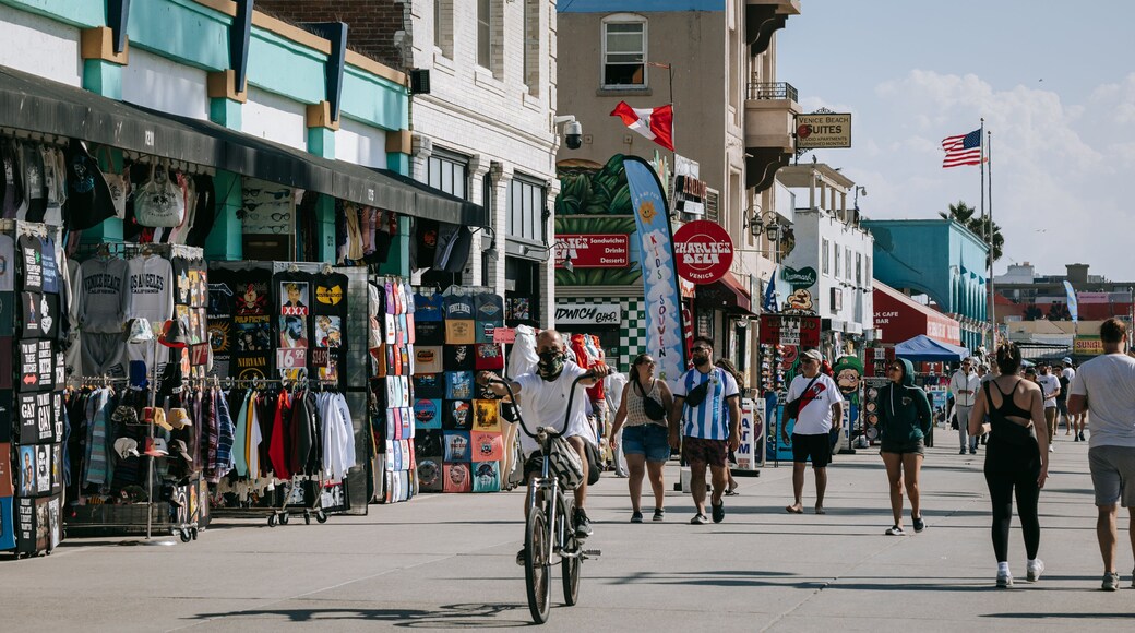 Venice Beach Boardwalk showing cycling and street scenes