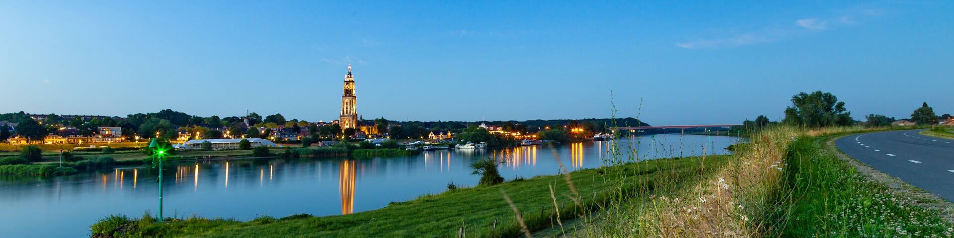 Skyline of the city of Rhenen during the evening with Cunera church and river Nederrrijn in the provence of Utrecht in the Netherlands