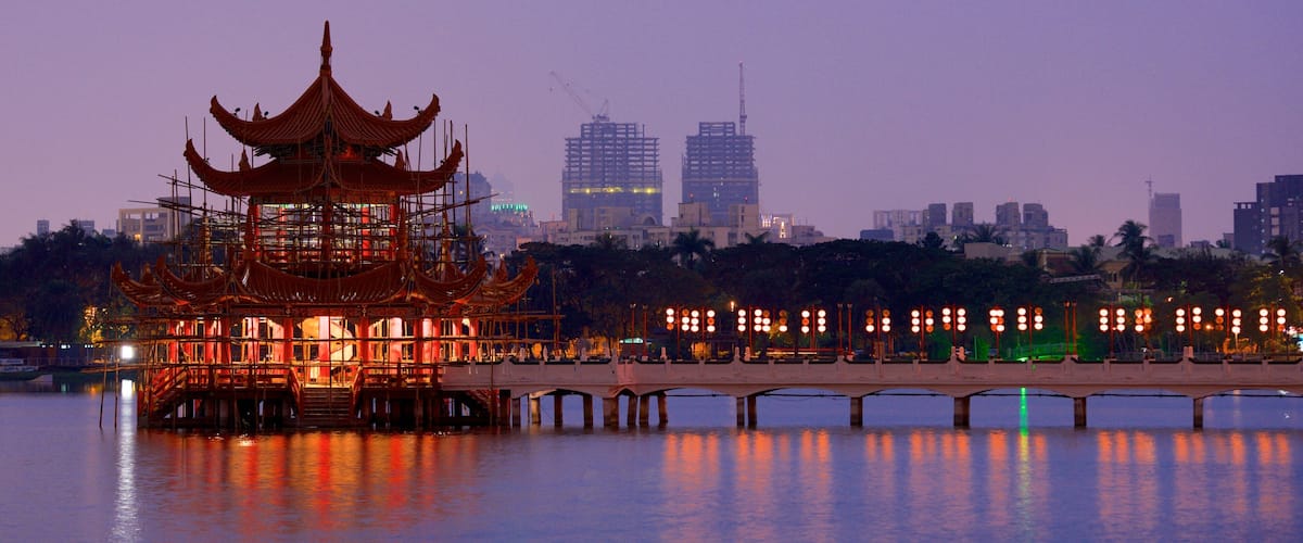 Spring and Autumn Pavillions showing a sunset, a temple or place of worship and a lake or waterhole