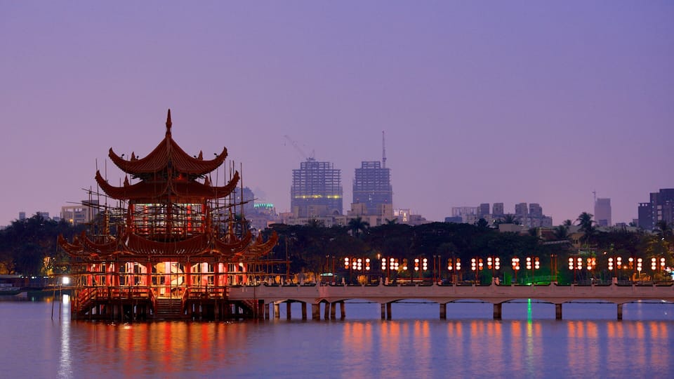 Spring and Autumn Pavillions showing a sunset, a temple or place of worship and a lake or waterhole