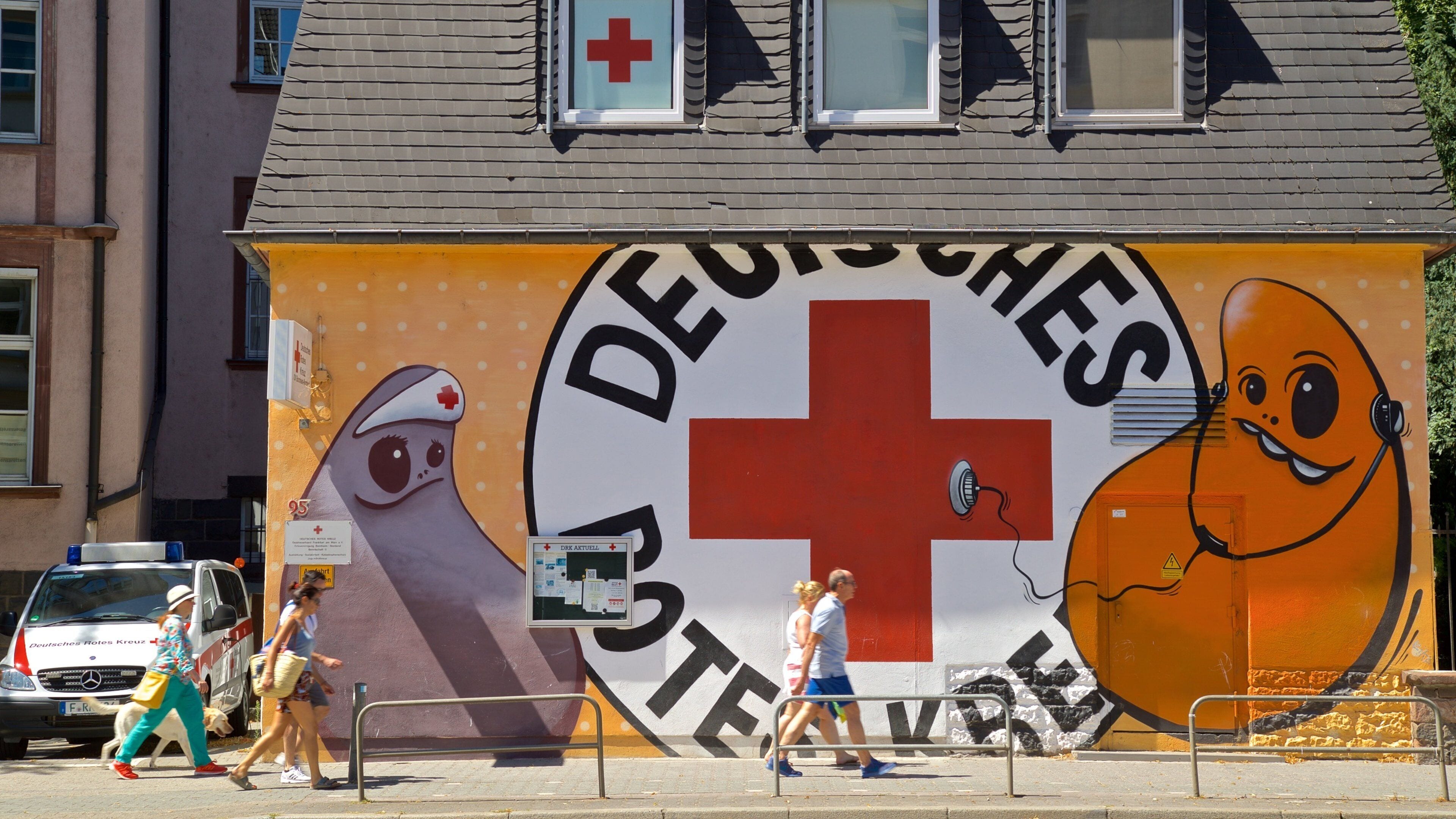 Bornheim featuring street scenes and outdoor art as well as a small group of people