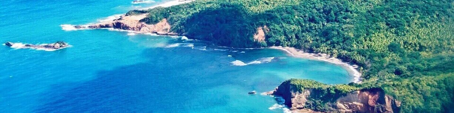 The rough-hewn northern coast of Dominica. The tough coastline and mountainous interior made Dominica unsuitable for large colonial sugar plantations, and it now lays claim to the most pristine wilderness in the Caribbean. So pristine, in fact, that you can still drink water from streams without filtration or purification.