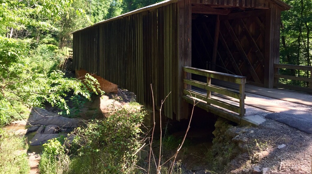 Originally built in 1897 this bridge was moved here in 1924 to support a grist mill that was here. It is one of only a handful of covered bridges in Georgia that are still in use.