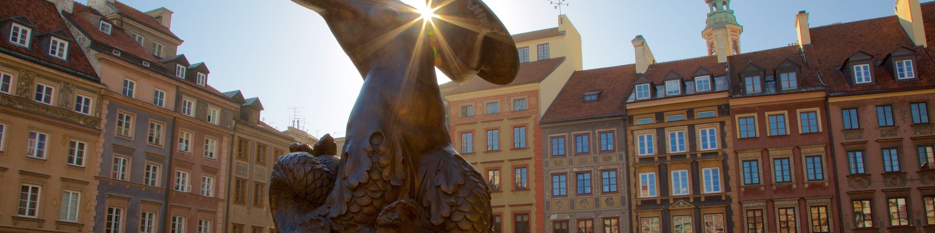 Estátua da Sereia de Varsóvia que inclui uma estátua ou escultura, elementos de patrimônio e uma praça ou plaza