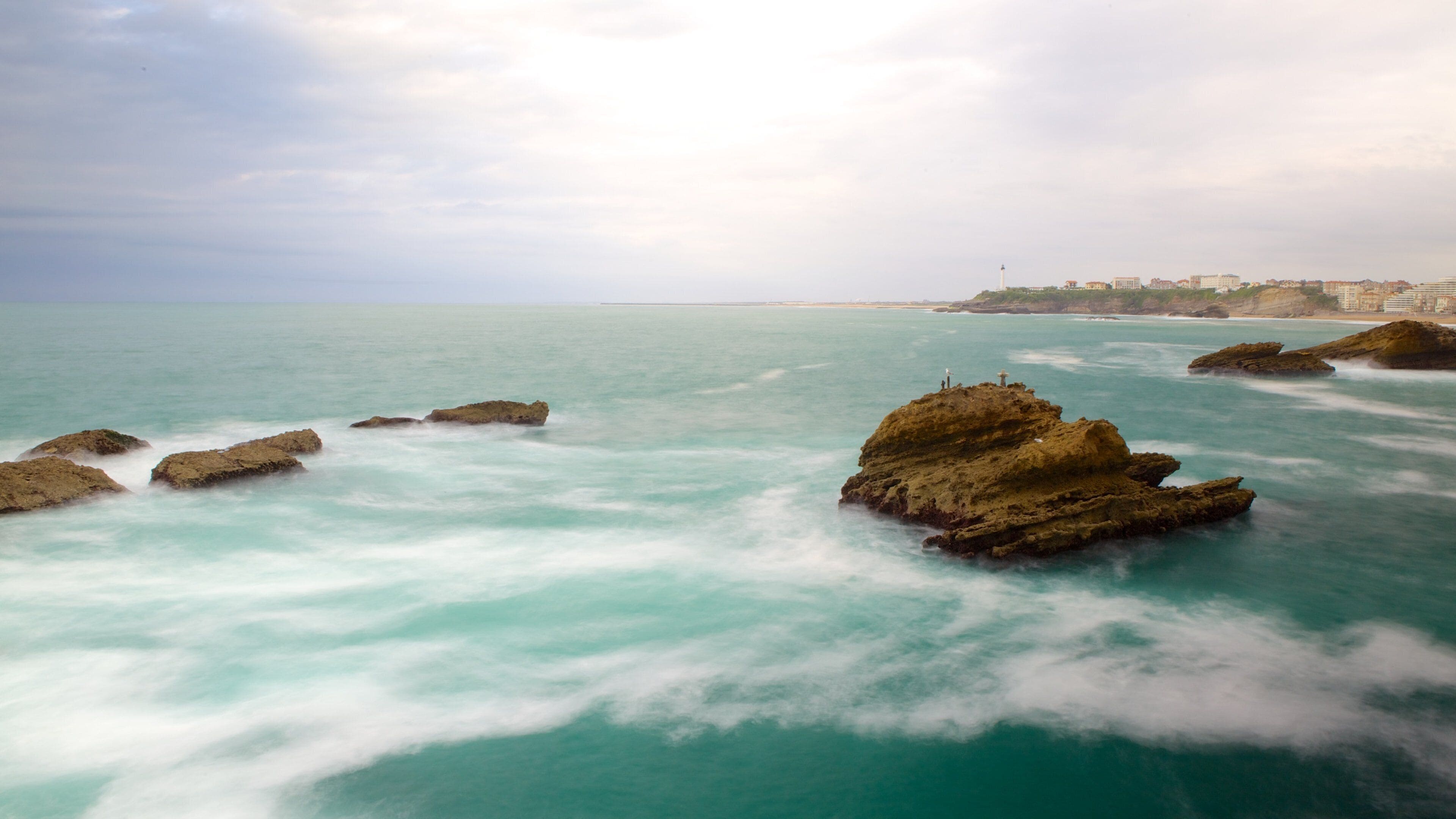 Virgin\'s Rock featuring rocky coastline