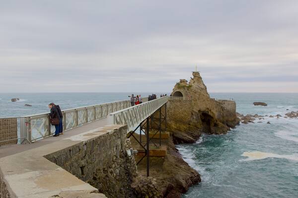 Virgin\'s Rock which includes landscape views and rocky coastline