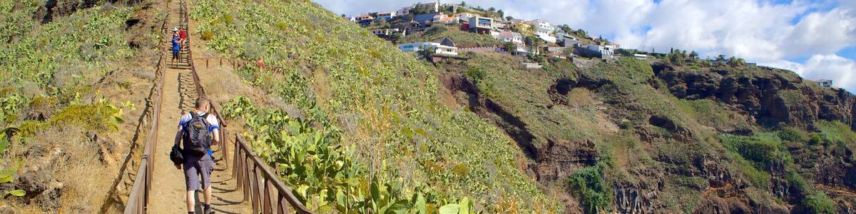 Ponta da Oliveira featuring hiking or walking, mountains and landscape views