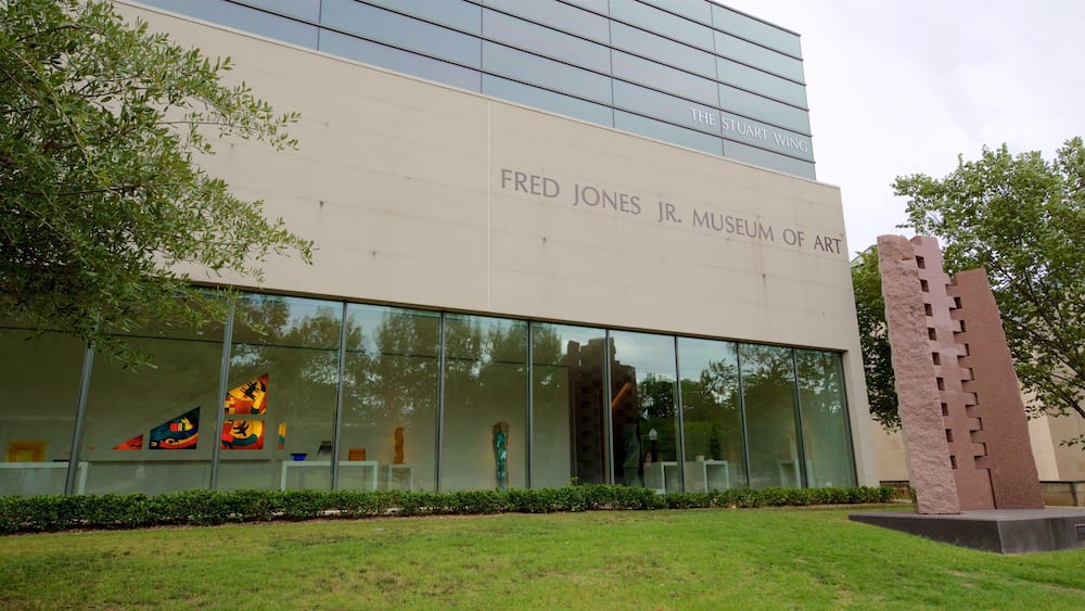 Fred Jones Jr. Museum of Art with modern architecture and glass facade.