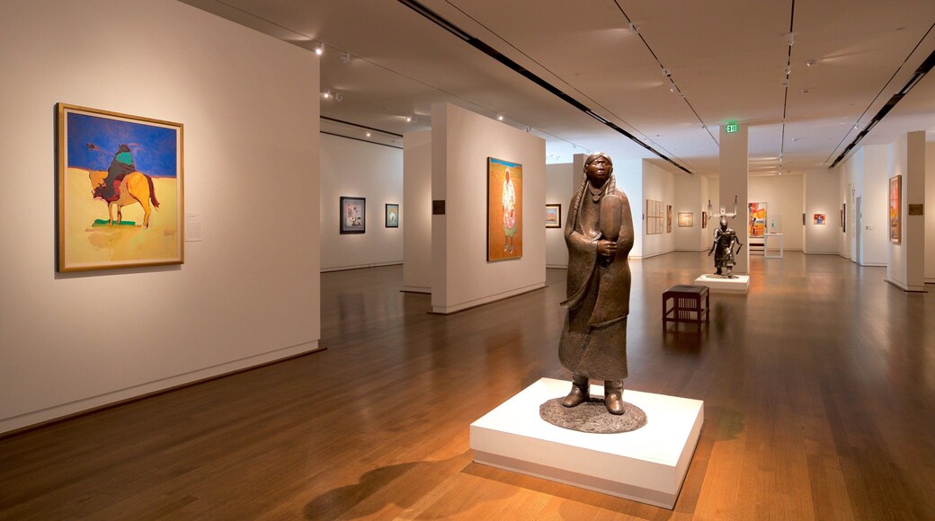Fred Jones Jr. Museum of Art which includes art, a statue or sculpture and interior views