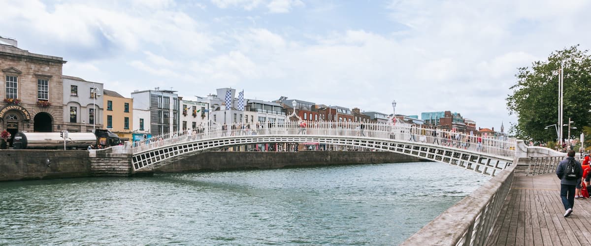 Ha\' Penny Bridge featuring a river or creek and a bridge