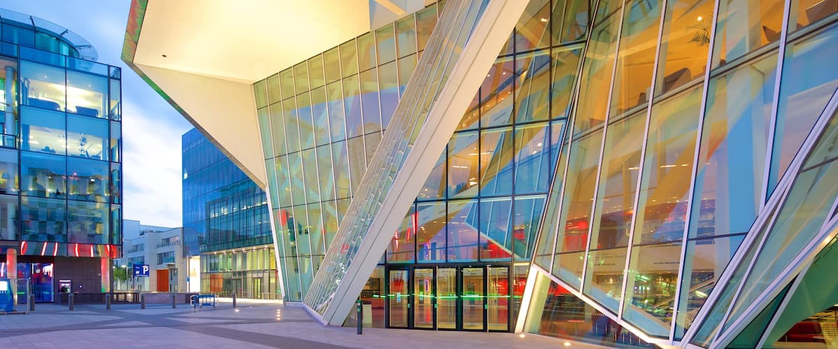 Bord Gáis Energy Theatre which includes street scenes, modern architecture and a sunset