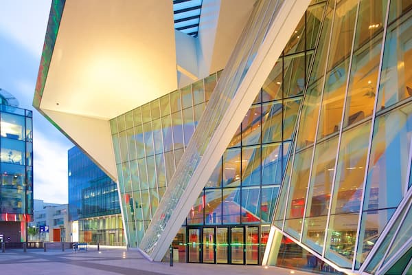 Bord Gáis Energy Theatre which includes street scenes, modern architecture and a sunset