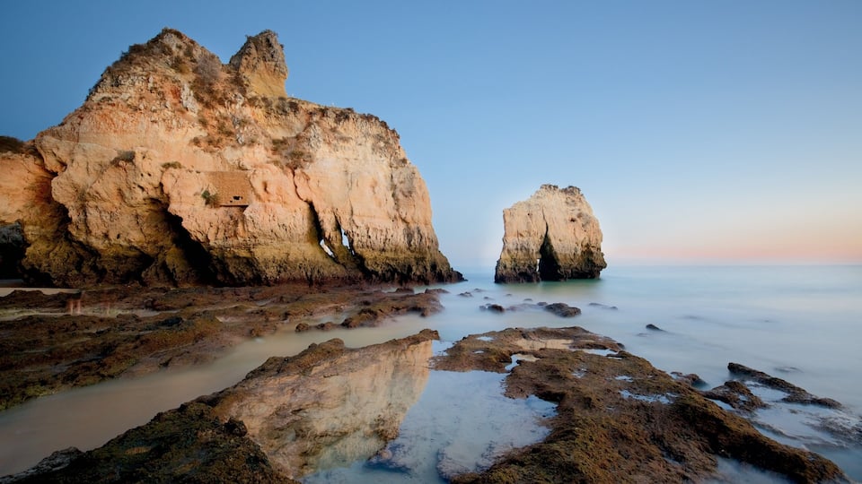 Tres Irmaos Beach featuring a sunset, a beach and general coastal views