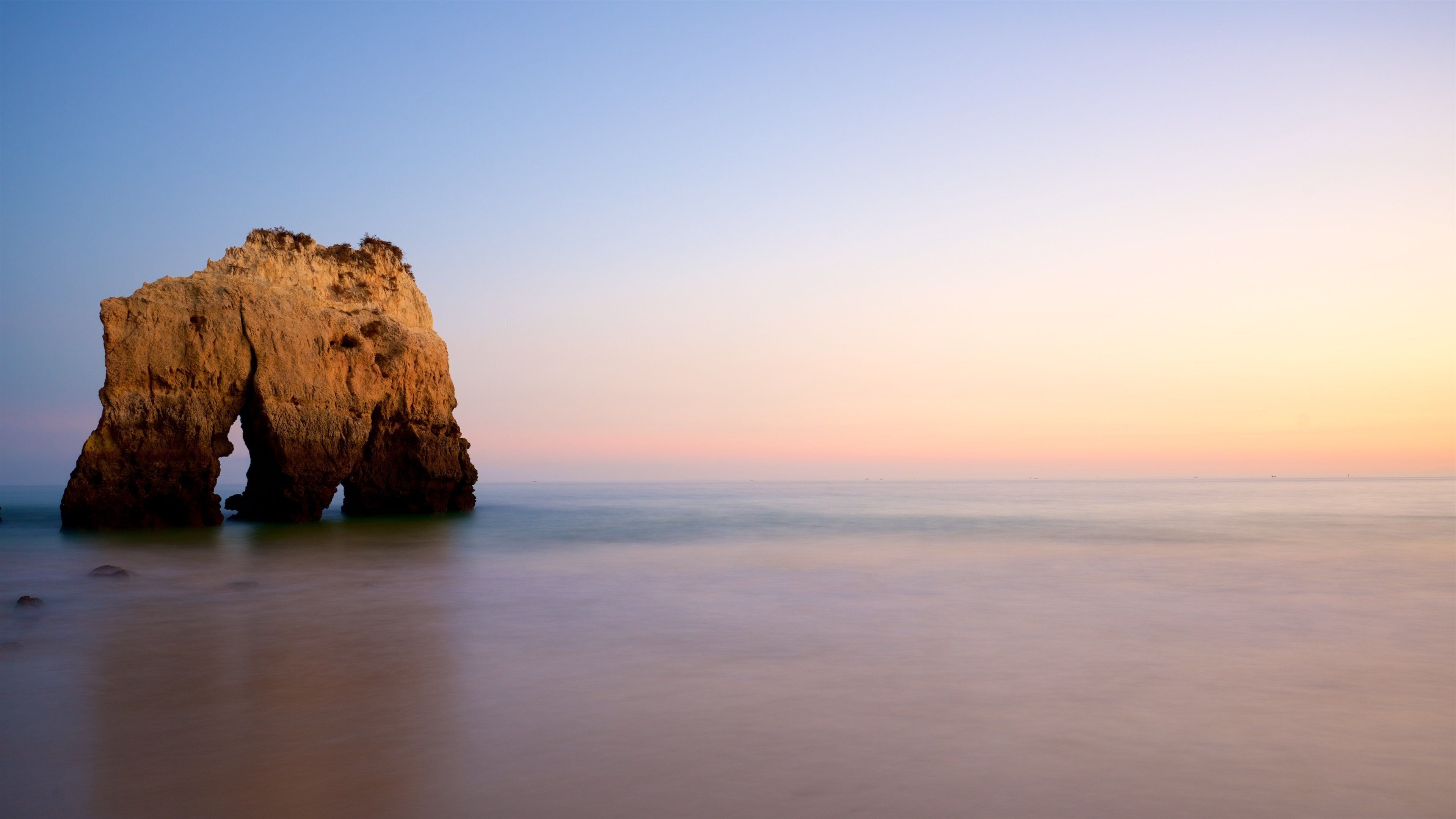Tres Irmaos Beach featuring a sandy beach, a sunset and general coastal views