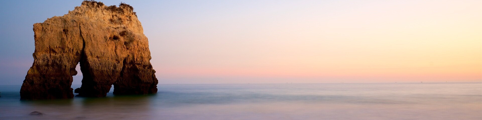 Tres Irmaos Beach featuring a sandy beach, a sunset and general coastal views