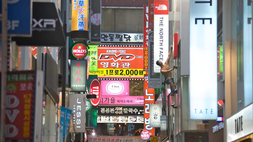 Myeongdong featuring a city, signage and central business district