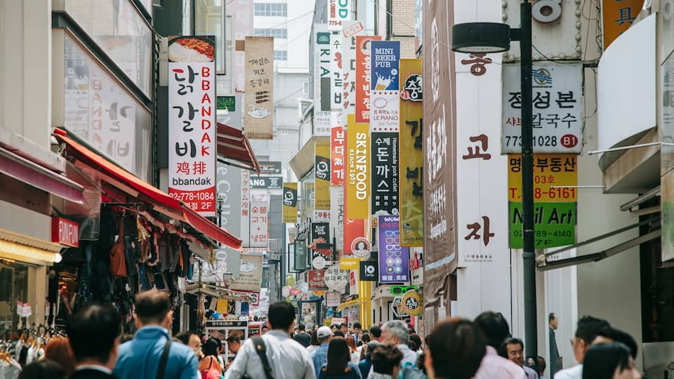 Myeong-dong featuring street scenes and a city