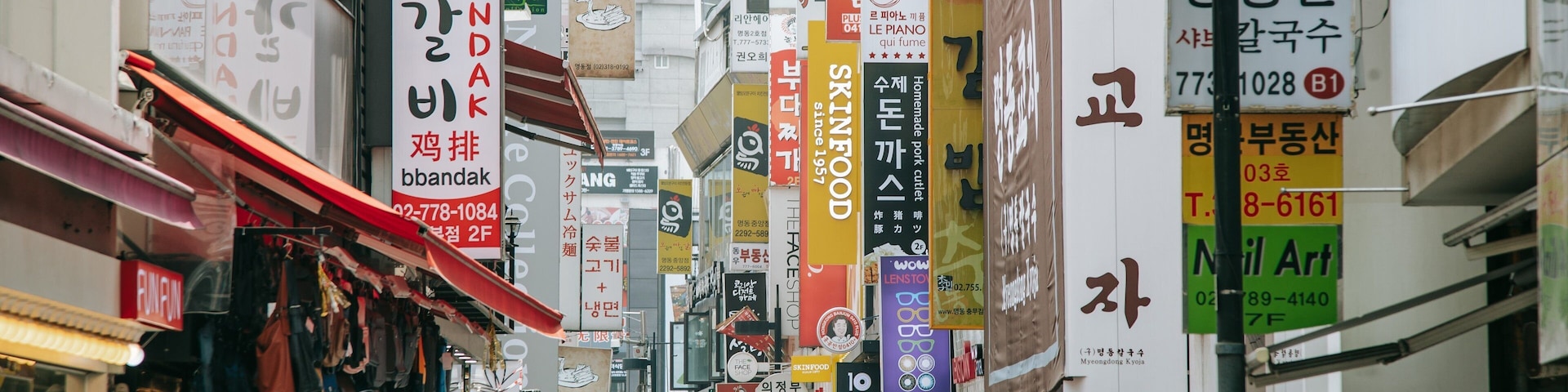 Myeong-dong featuring street scenes and a city