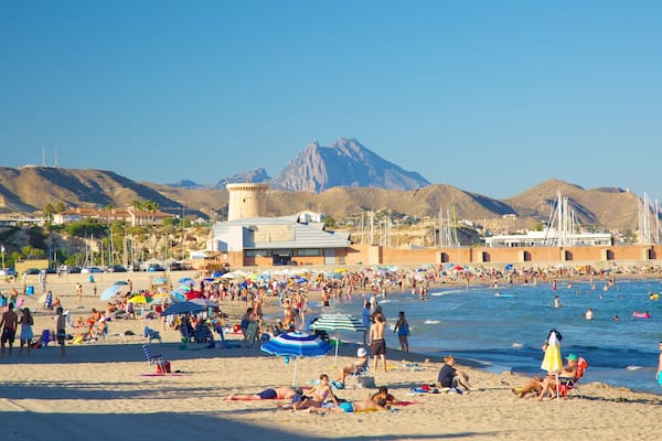 Campello Beach which includes swimming, a sandy beach and a bay or harbor