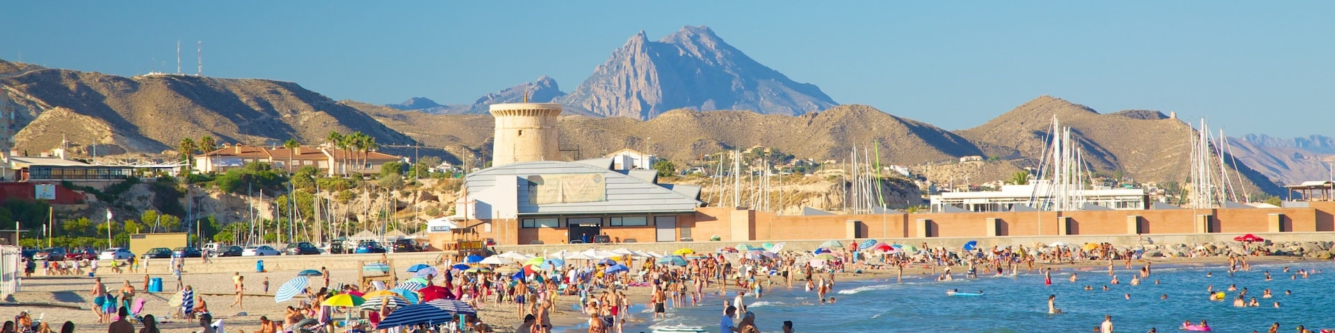 Campello Beach which includes swimming, a sandy beach and a bay or harbor