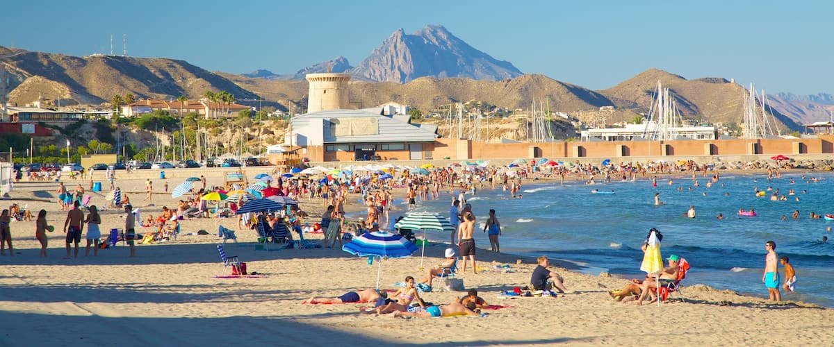 Campello Beach which includes swimming, a sandy beach and a bay or harbor