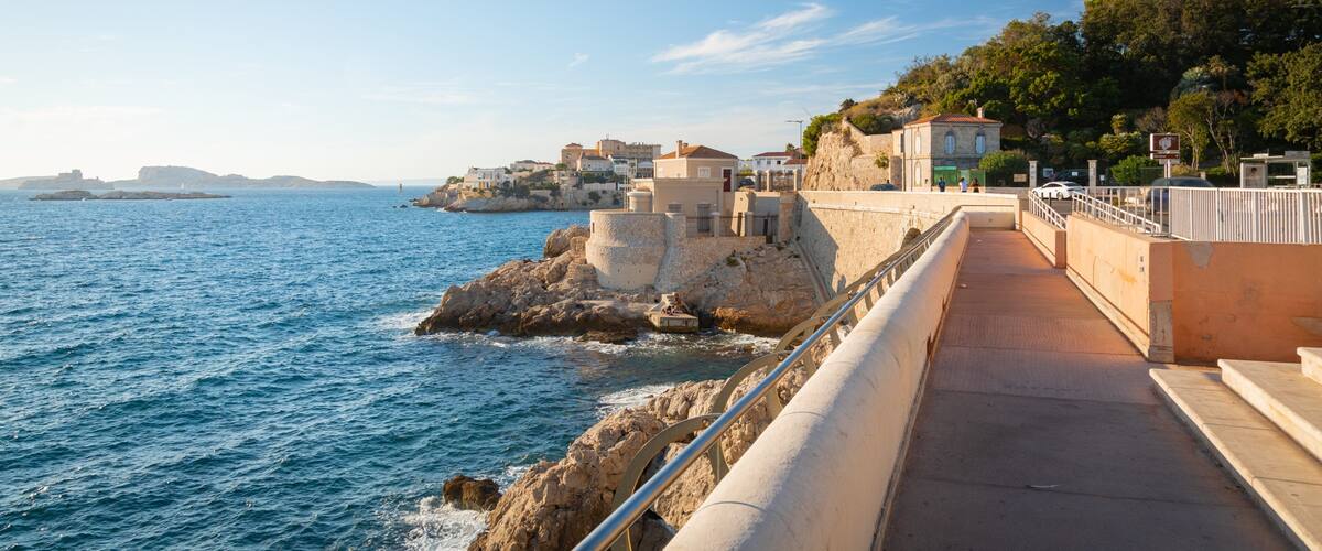 La Corniche which includes a coastal town and general coastal views