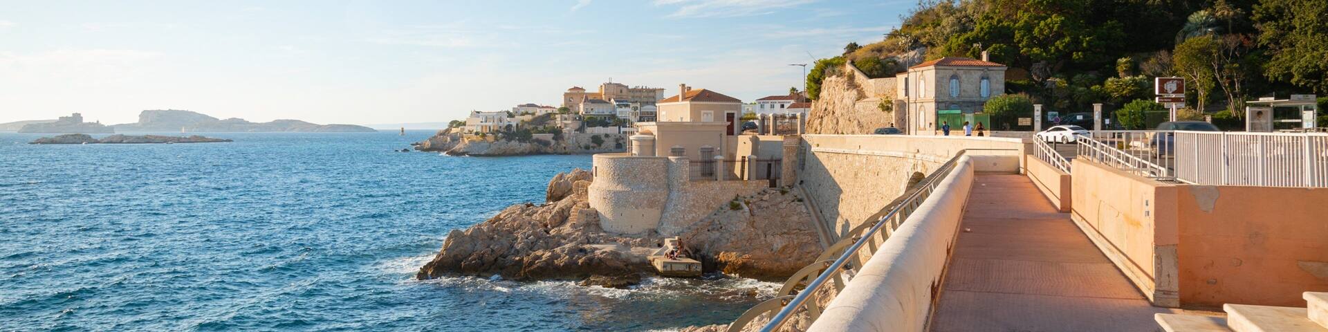 La Corniche which includes a coastal town and general coastal views