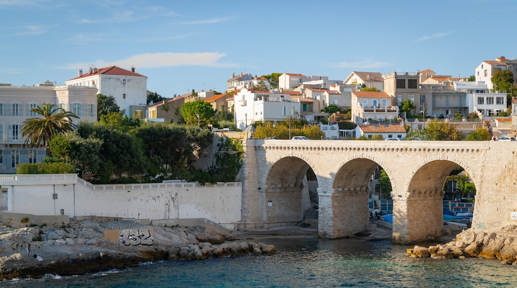 La Corniche which includes a bridge and a river or creek