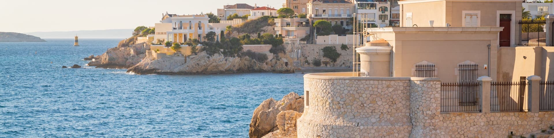 La Corniche featuring heritage elements, rugged coastline and general coastal views