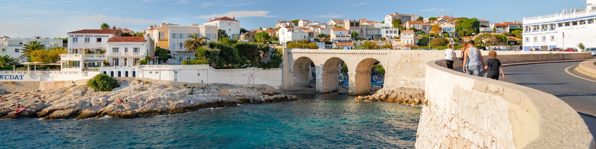 La Corniche showing a river or creek and a bridge