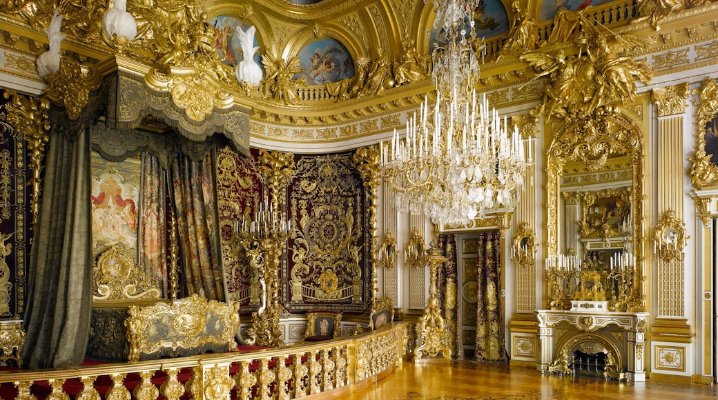 Herrenchiemsee Castle featuring a church or cathedral, heritage elements and interior views