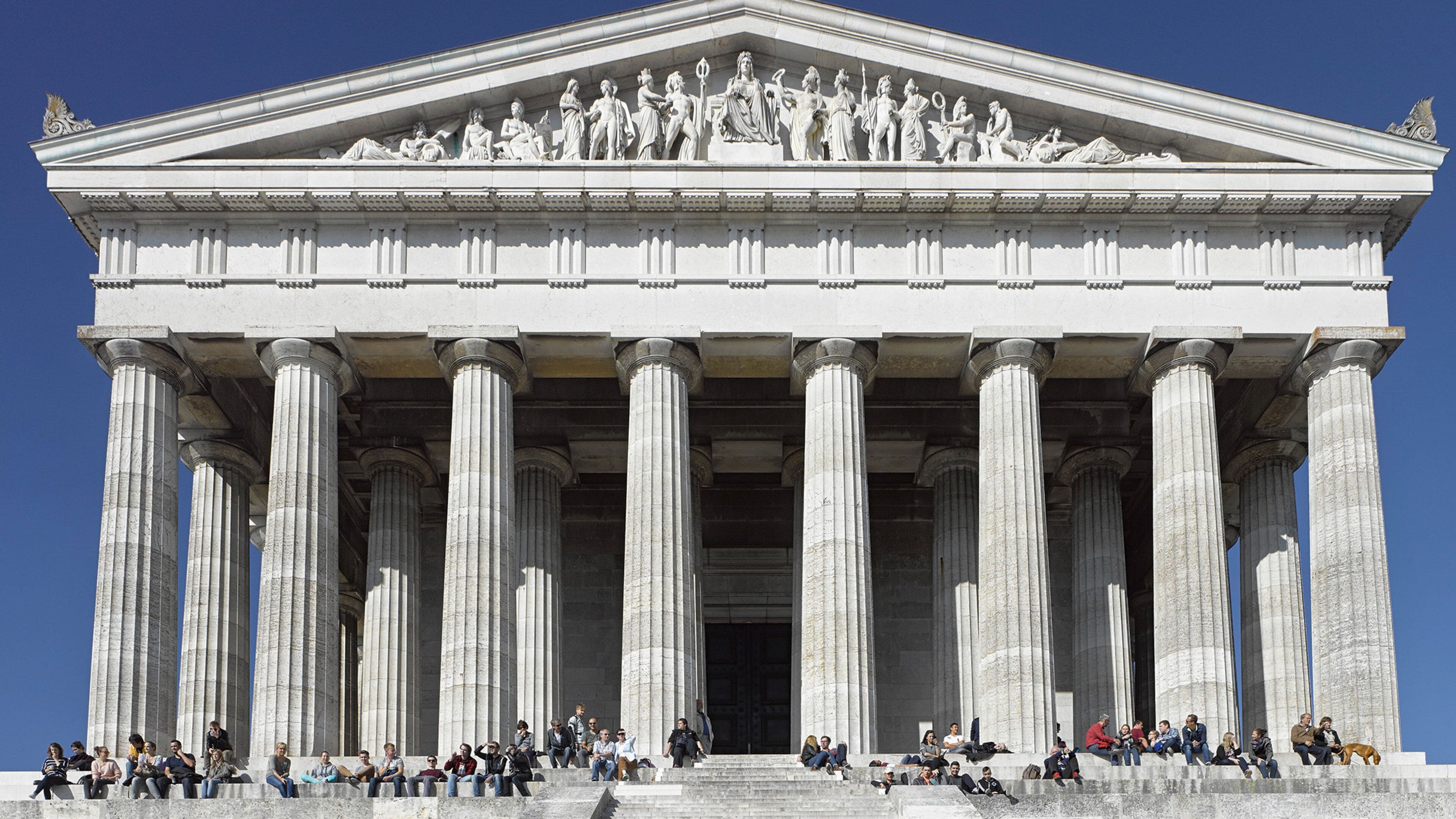 Walhalla Temple which includes heritage architecture as well as a large group of people