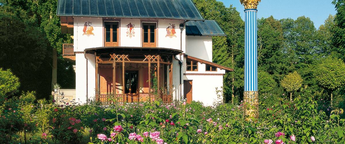 Rose Island featuring wildflowers and a house