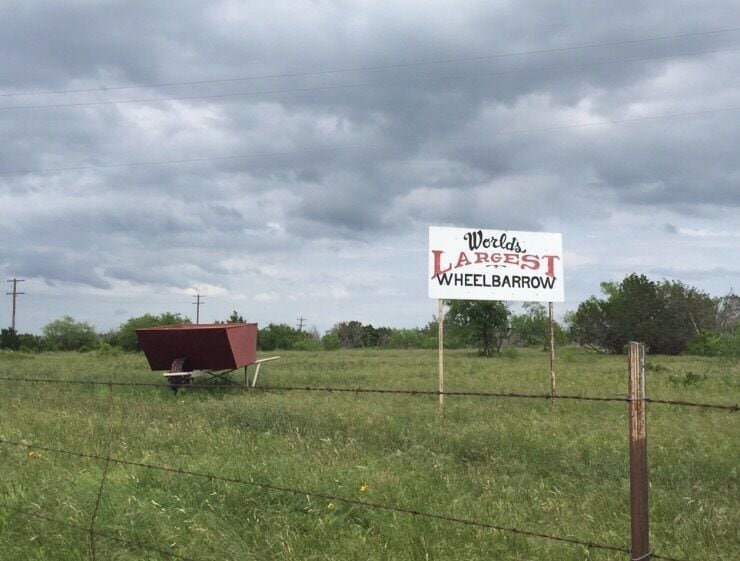 Weird and kind of cool, massive wheelbarrow with a sign that claims to be the world's largest. Not sure if that's officially true, but it's pretty huge so I guess there really wouldn't be another one anywhere else.