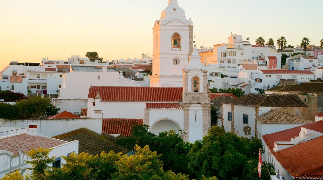 Santo Antonio Church featuring a city and a sunset