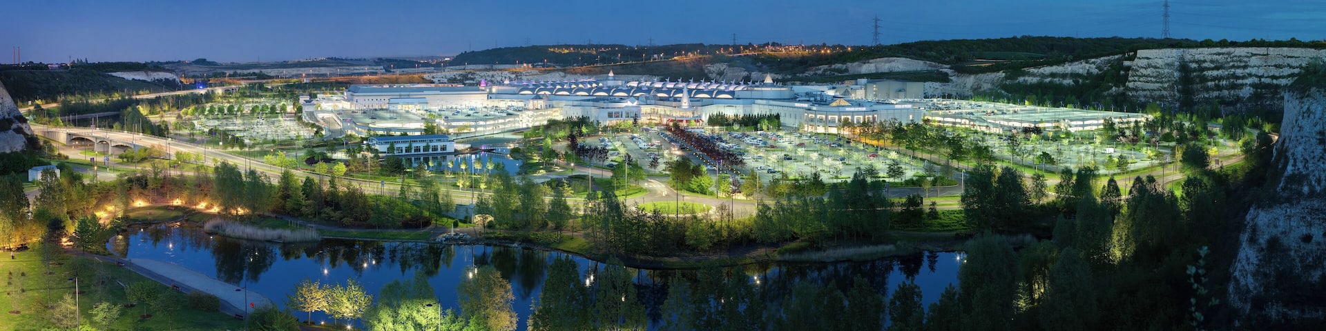 A 63 segment exposure fusioned image (3 exposure frames * 3 rows * 7 per row) of Bluewater Shopping Centre in Greenhithe, Kent, England. Taken by myself with a Canon 5D and 85mm f/1.8 lens.